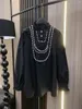 Blouses pour femmes 2024 Spring été luxe Luxury Femmes Pearl Black à manches longues Chemises pour femme GDNZ 2.27