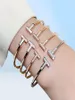 Principais designers de luxo Bracelete Women Charm Bracelet Trend Moda cravejada com diamantes pulseiras de pulseiras 18K Boutique de joias de ouro 18714487