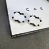 Klassische silberschildete Ohrringe Designer mit schwarzen weißen Diamanten modische trendige Mädchenohrringe hochwertige Schmuckohrringe mit Box Geburtstagsfeier