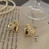 Ontwerper Miu Love Heart Vorme Earring Stud Women Hoge kwaliteit Titanium roestvrij staal Cool 18K Gouden oorbellen veelzijdige inbedding met parels sieradencadeau