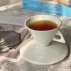 Tassen Untertassen rein weiße kreative einfache Keramik -Knochen -China -Paar Kaffee Tasse italienische Espresso Mini