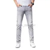 Дизайнерские джинсы для мужского качества мужской бренд моды летние эластичные брюки вымытые джинсы темные цветочные вышивки модные брюки
