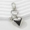 Keychains Modern Silver Heart Keychain Pentures personnalisées Décoration pour le sac clé Téléphone à la mode en métal accessoire