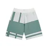 Trendy Rhude Patchwork kontrastierende Shorts Klassische Buchstaben Logo Hosen Lose lässige Herren gestrickte Shorts Kumpel Strandhosen CSD2404154-12