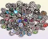 100pcslot des bijoux de bouton instantané de 12 mm 18 mm pour le bracelet instantané en métaux mélangés charmes de bricolage de bricolage
