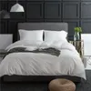 Sängkläder sätter lism 60-stycken bomullssatin fyrdelar uppsättning av massiv färg långstam enkel nordisk vanlig sängark