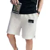 Waffle Shorts Men's Summer Thin Korean version av trenden Casual Five Quarter Pants bär alla matchande strand lösa shorts