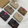Markendesigner Kuh Leder Brieftasche Mode Herren Frauen Geldbörsen luxurius hochwertige kurze Brieftasche für Männer Kreditkartenbrieftaschen mit Kasten