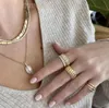 Обручальные кольца Классическое золото, покрытое лонжеводы Bling Clear Cz Snake Herringbone Ring Уникальное Iced Out Full Finger Women Band 9525822