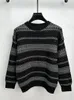 Chandails masculins Design avancé Hollow Out Fashion Stripe Sweater Round Nou Automne / hiver Personnalités de tendance décontractée personnalisée Pilluche tricotée