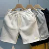 Pantanos cortos para hombres hombres trazando la cintura elástica de mediana altura bolsas de verano en la pierna ancha de la pierna suelta de la ropa deportiva