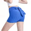 Nouvelle bulle avec des hanches surélevées, un arc à taille haute et un short à cordon, un ajustement slim féminin, un pantalon tripartite de yoga sexy F41516