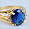 Pierścienie vintage żeński niebieski kryształowy pierścień kamienny kolor żółty złoty kolor dla kobiet luksusowy owalny cyrkon zaręczyny upuszczenie biżuterii Dhehg