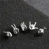 Studörhängen kreativ design rostfritt stål handgester för kvinnor män punk personlighet finger brosk örhänge smycken