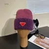 Bons de bonnet des bonnes Hémers d'hiver hommes et femmes du design de mode chapeaux en tricot prasda beanie automne bain cap lettre