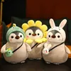 Plush Dolls 25cm Kawaii Penguin Toy Penguin Cute Transforms to Dinosaur Sunflower Doll تملأ هدايا دمية الوسادة الناعمة للأطفال والفتيات Y240415