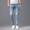 Designer de jeans masculin concepteur haut de gamme printemps / été jeans masculin à la mode slim slim fit small pieds minces polyvalents brodés polyvalents