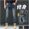 Męskie dżinsy projektant jesień marka mody koreańskie szczupłe spodnie Slim Fit grube haftowane niebieskie szary l1e8 Dostawa odzieżowa odzież otxym