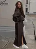 Robes de travail Oymimi Winter Brown Pu Leather Ensembles pour les femmes 2 pièces 2024 Mode à manches longues avec des jupes à fente de taille haute