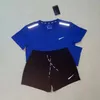 Uomini e donne designer tracce tech fitness stampare l'abbigliamento sportivo asciugatura rapida e la maglietta della giuntura traspirante Shorts Shorts a due pezzi.