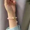 Instagram New Chinese Crystal Loop Single Loop White's White's Jade Peach Blossom Couleur préservant les petits bracelets à glands