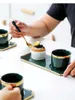 Tazze di tazza di caffè nordico set verde creativo con cucchiaio dim sum piatto pomeriggio manico nero maniglia per le tazze domestiche