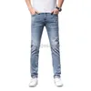 Designer de jeans masculin concepteur haut de gamme printemps / été jeans masculin à la mode slim slim fit small pieds minces polyvalents brodés polyvalents
