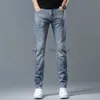 Projektant męski wiosna/lato nowe dżinsy Slim Fit Elastyczne wszechstronne, swobodne trend cienki stopy męskie noszenie luksusowe spodnie