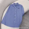レディースTシャツ春/夏ニッチトレンディブランドファイングリッドブルーペルレイドシャツフリルのカフスデザイン、ファッショナブルな汎用性