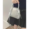 Kvällspåsar mini skal crossbody väska för kvinnor lyxig designer läppstift hörlurar dekorativa kvinnliga shoppare handväskor damer axel