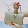 Cheap Store 90% Off Wholesale 2024 Wallte Metal Leaf Button Evening Dress Banquet Handheld Chain Strap Diagonal Cross Small Square Bag Womensluxury handbags