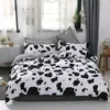 Set di biancheria da letto moderna copertura trapunta di mucca a quadri bianchi nera