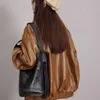 Lente 2024 Toplaag Cowhide Soft Leather Bucket Bag Kleine en grote capaciteit die een schouderkruistas voor vrouwen pendelt