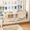 Keuken opslagrek tafelbladgerechten kommen chopsticks huishoudelijke vensterbank smalle stijl luchtafvoer water