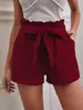 Summer Femme en lin est décontracté shorts avec poches de couleur unie à taille haute haute taille 240407