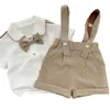 Set di abbigliamento 2024 Summer Children Case Set Codice in stile Cotton College Strishers Swiust Sut Solid White Shirt Include il papillon per 0-6y