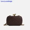 Womens Knot With Chain Minaudiere Clutch BotegaVeneta Padded Intreccio Leather Minaudiere With Cross-body Leather Braided Metal Chain Metallic Knot Closure GXRS