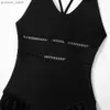 Nieuw zwart uit één stuk zwempak uit één stuk voor 5-12 jaar Girls Fashion Hollow Out zwempak Hoogwaardige Summer Beachwear Swimwear Y240412