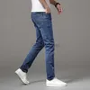 Designer en jeans masculin grand frein nouveau jean jeans masculin marque en métal décoration slim slim small pieds pantalon long élastique décontracté