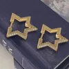 Boucles d'oreilles de cerceau Stars Fashion Women's Star Design Golden Color Jewelry Shiny Zircon Girls Christmas Gift Wholesale