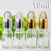 収納ボトル工場卸売グラス10ml eジュースエリキッド空のガラスドロッパーボトル金銀ねねじキャップが入っています