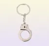 Simulering Handcuffs Metal Keychain Car Key Bottle Opener Män och kvinnor Keychain2925942