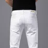 Designer de jeans masculin designer des concepteurs de jeans masculins printemps et d'été Nouveaux jeans blancs de mode masculine petits pieds et genoux zipper slim pantalon masculin homosexuel