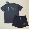 Uomini e donne designer tracce tech fitness stampare l'abbigliamento sportivo asciugatura rapida e la maglietta della giuntura traspirante Shorts Shorts a due pezzi.