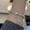 Instagram Korean Wind Sea Blue Treasure Crystal Single Pętla Kobiet Kobiet Pearl Pearl Bransel