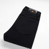 Męski projektant dżinsów zimowe bawełniane dżinsowe spodnie Nowy produkt dżinsy męskie proste legalne pluszowe zagęszczone czarne dżinsy