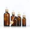 Garrafas de armazenamento 20 ml de vidro marrom garrafa de madeira tampa giratória para óleo/essência/soro/líquido/cuidados com a pele embalagem de pele