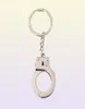 Simulering Handcuffs Metal Keychain Car Key Bottle Opener Män och kvinnor Keychain2389305