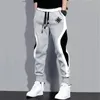 Mannhose Jogginghose Herren Kleidung Frauen Hosen lässige Jogger Streetwear Running Mode gedruckt schwarz grau Farbpatchwork 240412