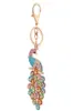 10pcslot femmes Paacock Keychain Bling Rignestone Key Chain élégant coloré de paon animal clé clés sac à bague Pendant charme de charme 7138377